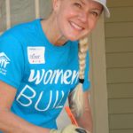 Crissy, a woman helping with fixing a house.