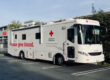 Red Cross Van in a parking lot.