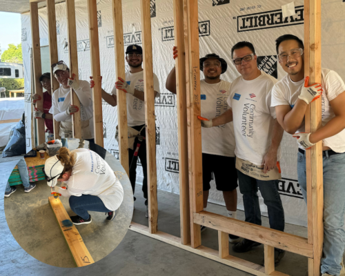 volunteers framing walls