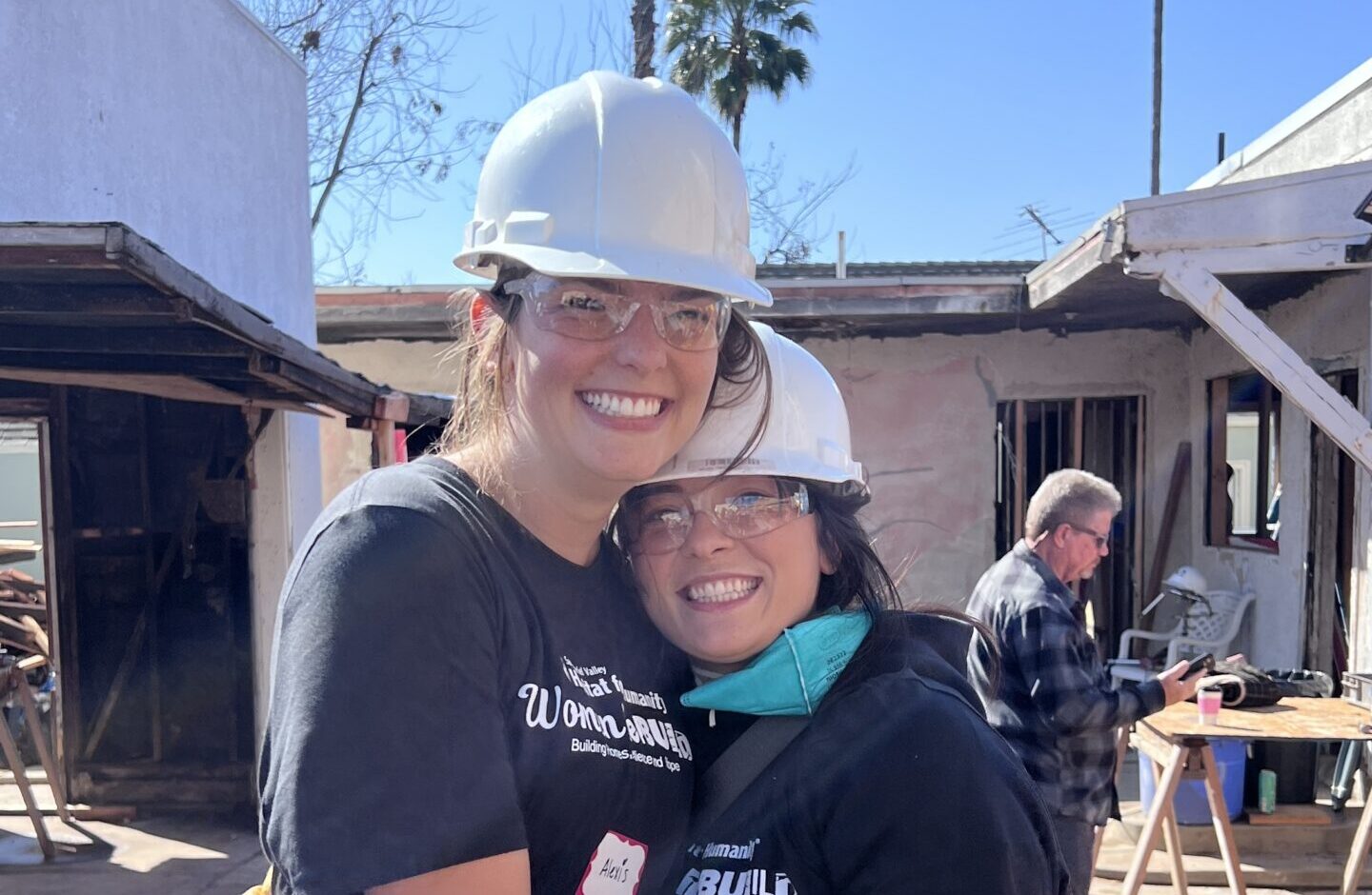 two women from sponsor Lunar at Women Build 2025 event in El Sereno