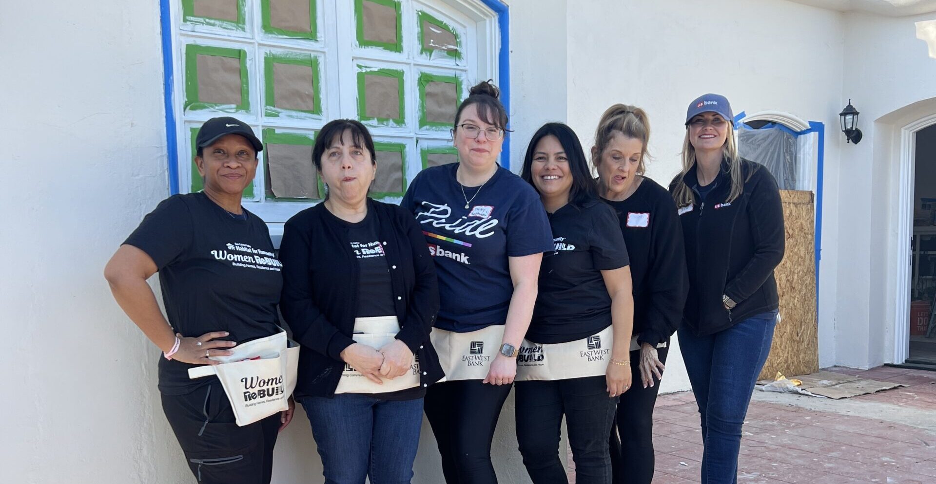 6 women in front of Keats house for US Bank at Women Build 2025