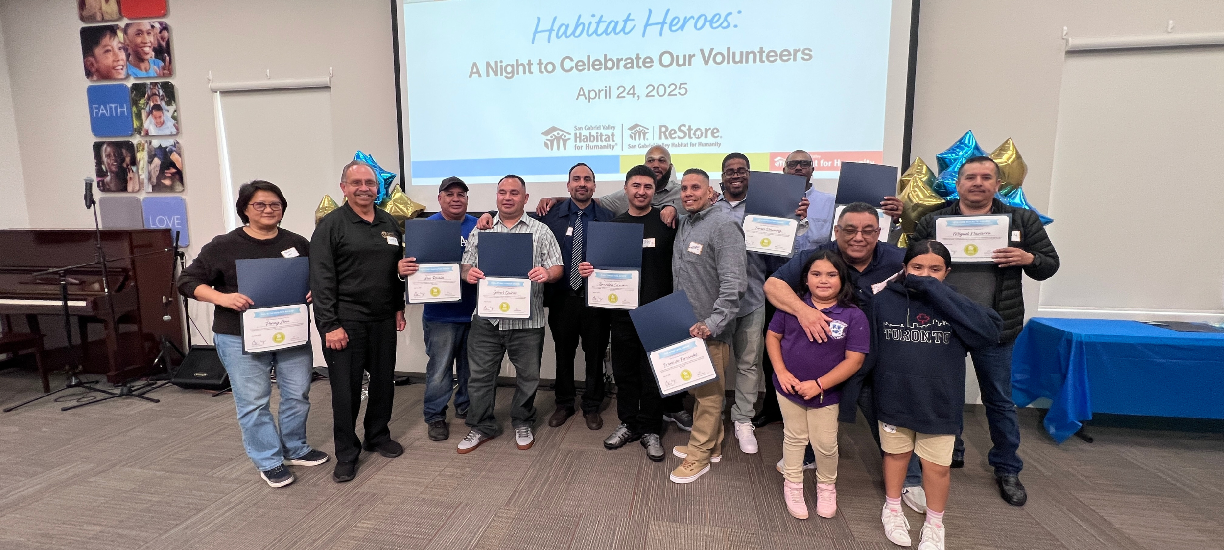 group standing with awards