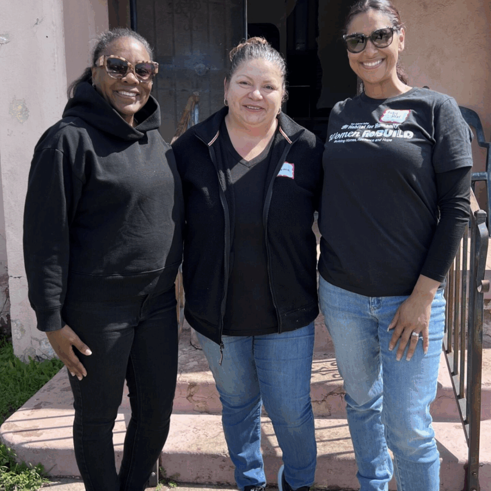 edison volunteers with homeowner norma