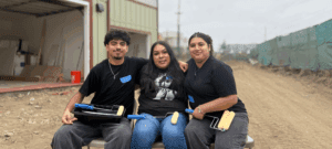 boy, mom and daughter sitting and smiling
