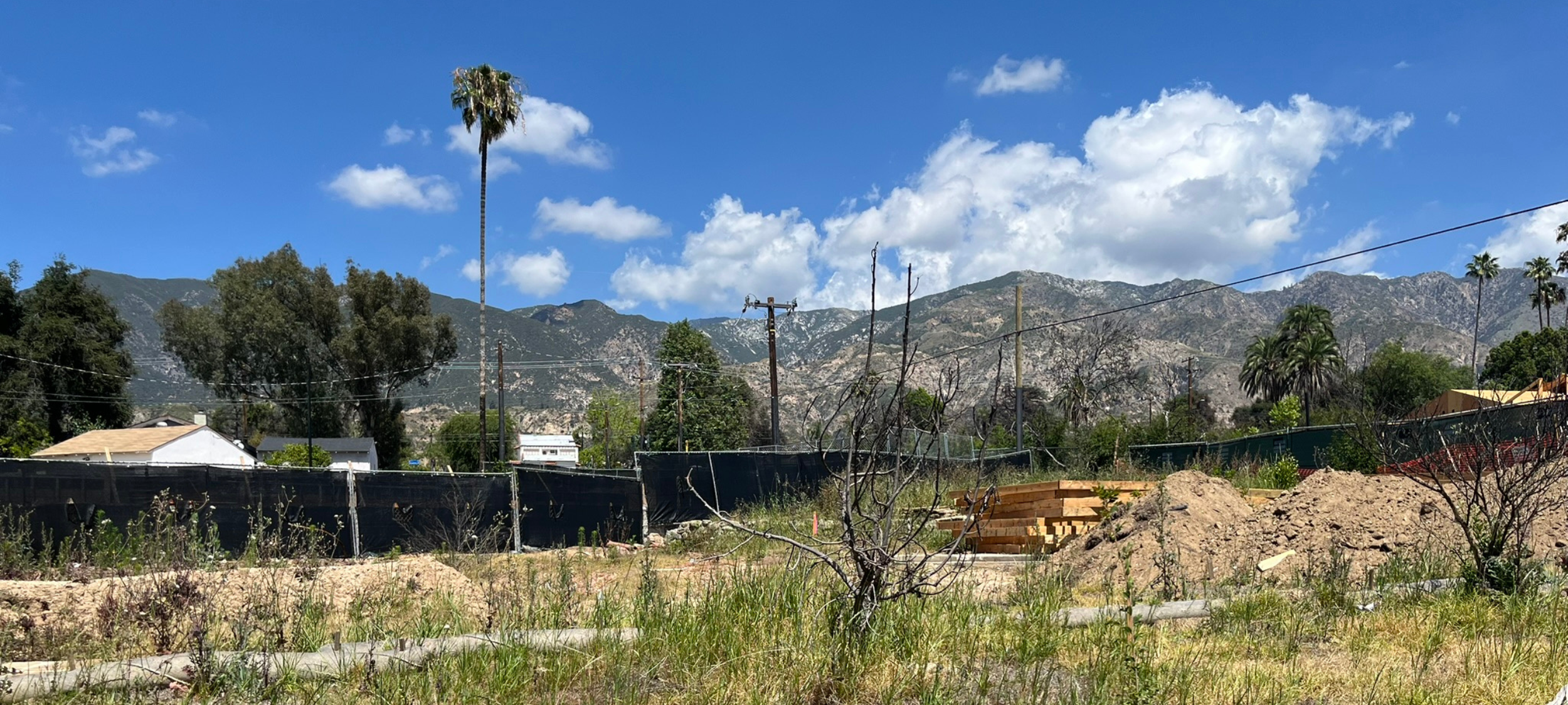 plot of land with sky and mountains