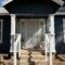 Painted and clean front porch with dark blue paint