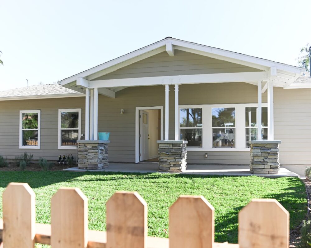 Beautiful new home with white trim and stonework