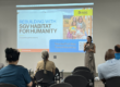 Presenter speaking at a San Gabriel Valley Habitat for Humanity rebuilding information session for Eaton Fire survivors.