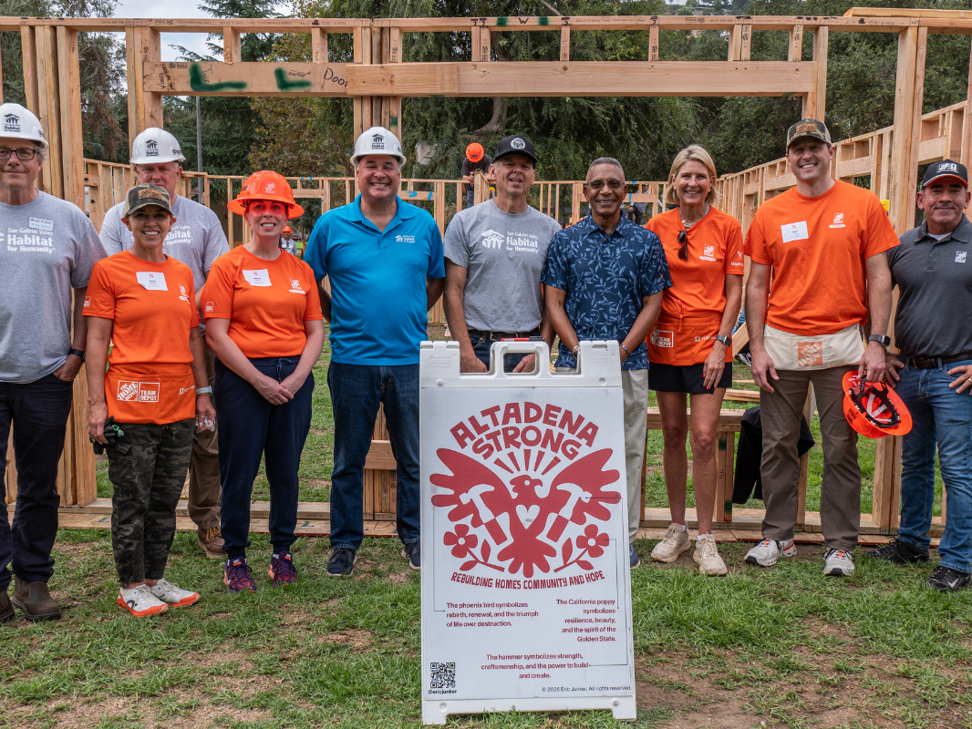group photo posing with Altadena Strong signage