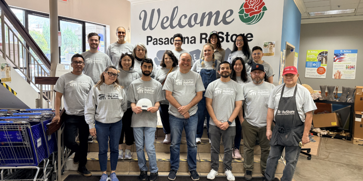 group standing in front of pasadena restore