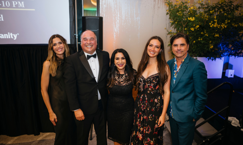 group of guests posing for a photo