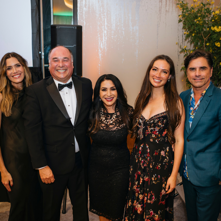 group of guests posing for a photo