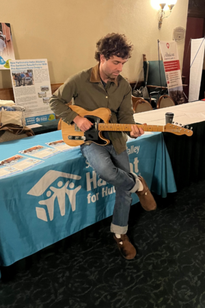 Taylor Goldsmith with Fender Guitar