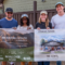 group standing holding a banner featuring the home that will be built in the future